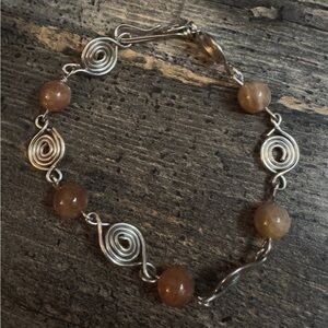 Elegant Silver Swirl and Sunstone Beaded Bracelet